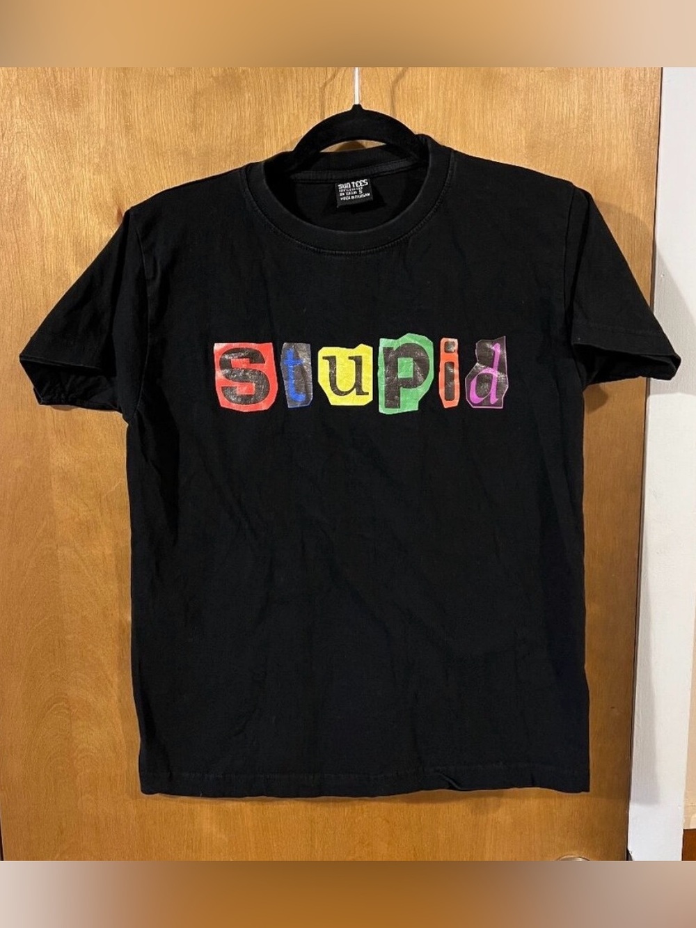 Sun Tees Women's Black Colorful Graphic 'Stupid' Short Sleeve Shirt - Small